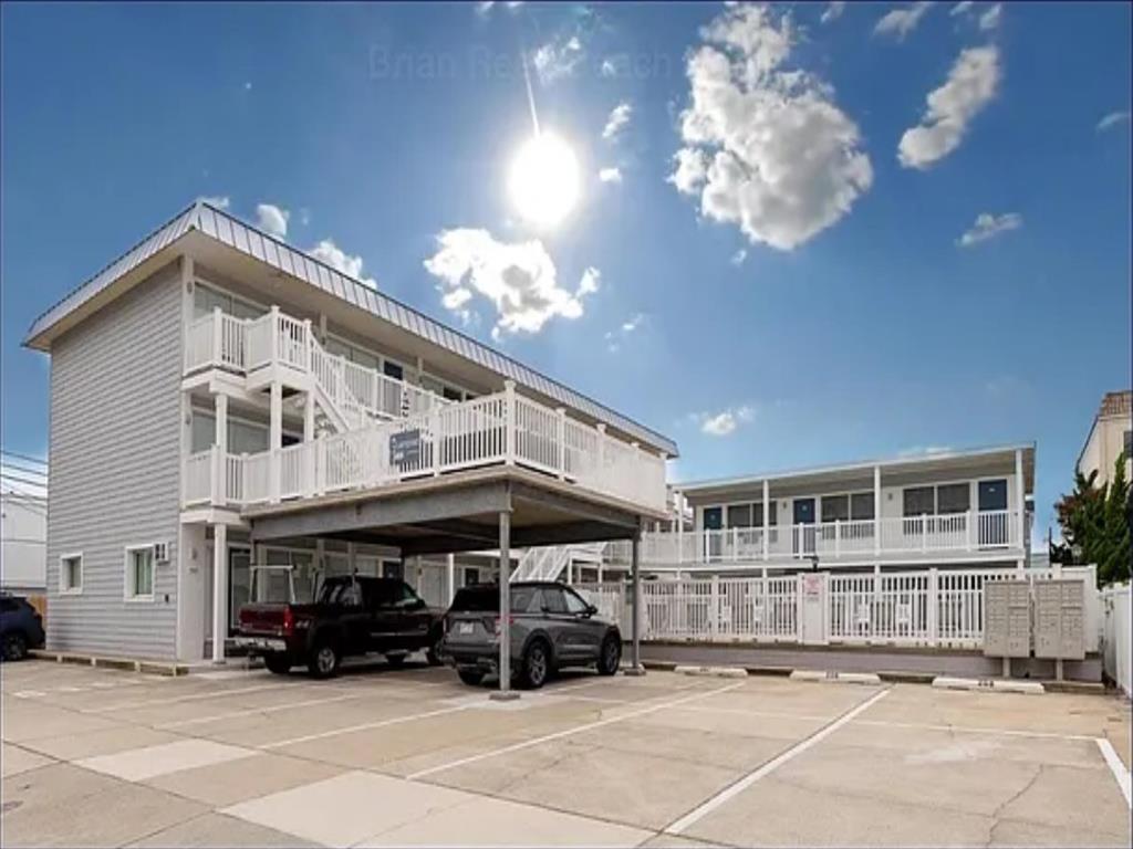 442 EAST 21ST AVENUE – LAMPOST #213 - NORTH WILDWOOD SUMMER VACATION RENTALS with POOLS at WILDWOODRENTS.COM managed by ISLAND REALTY GROUP, NORTH WILDWOOD REALTORS AND VACATION RENTAL MANAGEMENT - Welcome to your cozy beachside retreat in North Wildwood! This charming property is perfect for a family of 4 looking to enjoy a relaxing getaway by the shore. This Studio unit features 1 full bathroom and can comfortably sleep 4 guests. The sleeping arrangements include 1 double bed, 2 single beds(trundle bed), ensuring a restful night's sleep for everyone. Inside, you'll find all the comforts of home, including a well-equipped kitchen with a microwave, coffee maker, toaster oven, stove, and full-size refrigerator. The living area is furnished with a smart TV for entertainment, and high-speed internet is included for your convenience. Step outside onto the deck to soak up the sun or enjoy al fresco dining with deck furniture and a natural gas BBQ grill. The property also offers access to a heated outdoor pool, perfect for a refreshing swim on warm days. Additional amenities include ceiling fans, a washer and dryer (coin-operated), wall AC, parking for 1 vehicle, and an outdoor shower for rinsing off after a day at the beach. The property is smoke-free and does not allow pets. North Wildwood Rentals, Wildwood Rentals, Wildwood Crest Rentals and Diamond Beach Rentals in all price ranges for weekly, monthly, seasonal and weekend vacation rentals plus Wildwood real estate sales of homes, condos, vacation and investment properties in and around Wildwood New Jersey. We offer over 400 properties plus exclusive vacation homes so you can book the shore rental of your choice online and guarantee your vacation at the Shore. Rent with confidence at Island Realty Group! Visit www.wildwoodrents.com to book online or call our office at 609.522.4999. Our office at 1701 New Jersey Avenue in North Wildwood is open 7 days a week!