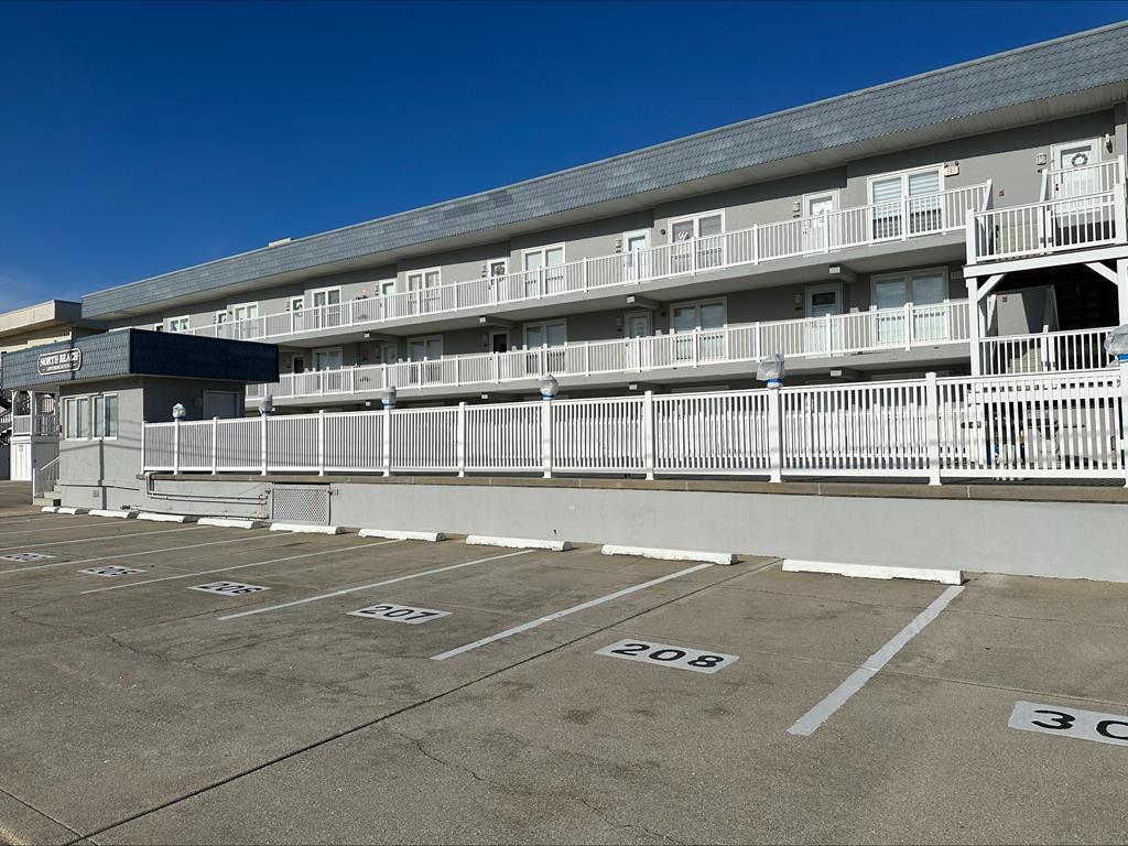 511 EAST 3RD AVENUE  NORTH BEACH CONDOS #208 - NORTH WILDWOOD SUMMER VACATION RENTALS with POOLS at WILDWOODRENTS.COM - 2 bedroom, 1 bath with HEATED POOL. This second floor end unit is the perfect place to sit and enjoy the ocean - Sleeps 8 - one bedroom has full/ twin bunk and twin and master bedroom has a queen and a twin. North Wildwood Rentals, Wildwood Rentals, Wildwood Crest Rentals and Diamond Beach Rentals in all price ranges for weekly, monthly, seasonal and weekend vacation rentals plus Wildwood real estate sales of homes, condos, vacation and investment properties in and around Wildwood New Jersey. We offer over 400 properties plus exclusive vacation homes so you can book the shore rental of your choice online and guarantee your vacation at the Shore. Rent with confidence at Island Realty Group! Visit www.wildwoodrents.com to book online or call our office at 609.522.4999. Our office at 1701 New Jersey Avenue in North Wildwood is open 7 days a week!