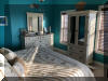 520 EAST STOCKTON ROAD  STOCKTON BEACH HOUSE #105 - WILDWOOD CREST BEACHFRONT SUMMER VACATION RENTALS with POOLS at WILDWOODRENTS.COM managed by ISLAND REALTY GROUP - Welcome to your dream vacation rental in Wildwood Crest! This spacious property can comfortably accommodate up to 10 guests, making it perfect for large families looking for a beach getaway. With 4 bedrooms and 3 full bathrooms, this property offers plenty of space for everyone to relax and unwind. The sleeping arrangements include 1 King Bed, 2 Queen Beds, Full/twin bunk w/twin trundle ensuring a comfortable night's sleep for all. The amenities in this rental are sure to impress, with a fully equipped kitchen featuring a dishwasher, microwave, coffee maker, toaster, and toaster oven. Other conveniences include central AC, a washer and dryer, iron, ironing board, and vacuum cleaner. Entertainment options abound with 3 TVs, cable TV, and high-speed internet. Outside, guests can enjoy the outdoor pool, deck with deck furniture, BBQ gas grill, community hot tub, balcony, and shared beach equipment. The property also offers an elevator for easy access, parking for 2 vehicles, and beach chairs and umbrellas for a day by the ocean. This rental is furnished with all the comforts of home, including blankets, pillows, pots and pans, silverware, dinnerware, cooking utensils, and more. Additional amenities include a Crockpot, Keurig coffee maker, smart TVs with streaming services, and an outside shower shared with other guests. Please note that this property does not allow pets and guests are required to bring their own linens. The property is smoke-free and offers a storage area for your convenience. Guests can also enjoy access to the association pool and other common areas. Don't miss out on the opportunity to stay in this fantastic vacation rental in Wildwood Crest Beach Side. Book now for an unforgettable beach vacation experience! Wildwood Crest Rentals, North Wildwood Rentals, Wildwood Rentals and Diamond Beach Rentals in all price ranges for weekly, monthly, seasonal and weekend vacation rentals plus Wildwood real estate sales of homes, condos, vacation and investment properties in and around Wildwood New Jersey. We offer over 400 properties plus exclusive vacation homes so you can book the shore rental of your choice online and guarantee your vacation at the Shore. Rent with confidence at Island Realty Group! Visit www.wildwoodrents.com to book online or call our office at 609.522.4999. Our office at 1701 New Jersey Avenue in North Wildwood is open 7 days a week!