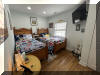 5604 PARK BOULEVARD #2 - WILDWOOD CREST SUMMER VACATION RENTALS at WILDWOODRENTS.COM managed by ISLAND REALTY GROUP - Welcome to your perfect vacation getaway in Wildwood Crest Bay Side! This charming property is ideal for families of up to 8 people, offering 2 bedrooms and 1 full bathroom. As you step inside, you'll find a cozy and well-appointed living space with comfortable sleeping arrangements including 1 Queen Bed, 2 Single Beds, 2 Single Sofa Beds, and 1 Queen Sofa Bed. The fully equipped kitchen features modern appliances such as a dishwasher, microwave, coffee maker, toaster, blender, stove, oven, and all the cookware and dinnerware you need to prepare delicious meals during your stay. Enjoy the convenience of central AC, a washer and dryer, iron, ironing board, and vacuum cleaner provided for your comfort. Relax on the deck with deck furniture and a BBQ gas grill for outdoor dining. High-speed internet and smart TVs with streaming services ensure you stay connected and entertained throughout your stay. This property also offers a balcony, wireless LAN, crockpot, Keurig coffee maker, shared outdoor shower, pillows, blankets, and all the essentials you need for a relaxing vacation. Small/Medium dog considered. Located just a short distance from the beach, shops, and restaurants, this property is the perfect home base for your Wildwood Crest adventure. Don't miss out on this fantastic opportunity to create lasting memories in this beautiful vacation rental. Wildwood Crest Rentals, North Wildwood Rentals, Wildwood Rentals and Diamond Beach Rentals in all price ranges for weekly, monthly, seasonal and weekend vacation rentals plus Wildwood real estate sales of homes, condos, vacation and investment properties in and around Wildwood New Jersey. We offer over 400 properties plus exclusive vacation homes so you can book the shore rental of your choice online and guarantee your vacation at the Shore. Rent with confidence at Island Realty Group! Visit www.wildwoodrents.com to book online or call our office at 609.522.4999. Our office at 1701 New Jersey Avenue in North Wildwood is open 7 days a week!