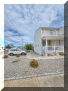 6909 PACIFIC AVENUE  UNIT 1 - 3 bedroom, 2 bath vacation home located in the heart of Wildwood Crest. 3 short blocks to the beach, and beautiful sunsets from Sunset Bay! Home offers a renovated kitchen with range, fridge, microwave, toaster, Keurig, coffee maker, blender, and wine refrigerator. Amenities include central a/c, washer/dryer, covered porch on the first floor and balcony on the 2nd, one car off street parking, and wifi. Sleeps 10: 2 kings, queen, twin/twin bunk and queen sleep sofa. Wildwood Crest Rentals, North Wildwood Rentals, Wildwood Rentals and Diamond Beach Rentals in all price ranges for weekly, monthly, seasonal and weekend vacation rentals plus Wildwood real estate sales of homes, condos, vacation and investment properties in and around Wildwood New Jersey. We offer over 400 properties plus exclusive vacation homes so you can book the shore rental of your choice online and guarantee your vacation at the Shore. Rent with confidence at Island Realty Group! Visit www.wildwoodrents.com to book online or call our office at 609.522.4999. Our office at 1701 New Jersey Avenue in North Wildwood is open 7 days a week!