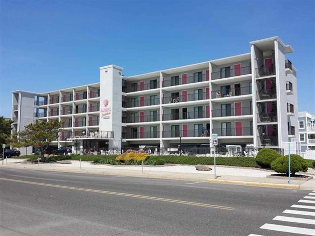900 KENNEDY DRIVE � OLYMPIC GARDENS #211 - NORTH WILDWOOD BEACHFRONT SUMMER VACATION RENTALS with POOLS at WILDWOODRENTS.COM managed by ISLAND REALTY GROUP - Welcome to your cozy beachside retreat in North Wildwood! This charming property is perfect for a small group of up to 3 people looking for a relaxing getaway by the sea. This studio-style unit features 1 full bathroom and is equipped with all the amenities you need for a comfortable stay. The sleeping arrangements include a plush queen bed and a convenient queen sofa bed, ensuring a good night's rest for all guests. The kitchen is fully stocked with modern appliances such as a dishwasher, microwave, coffee maker, and toaster oven, making meal preparation a breeze. The central AC keeps the space cool on hot summer days, while the vacuum cleaner helps you keep everything tidy. Step outside onto the deck and take in the fresh ocean air. The property also offers access to an outdoor pool, perfect for a refreshing dip after a day at the beach. With 1 parking space available, you won't have to worry about finding parking during your stay. Other amenities include a Keurig coffee maker, shared outdoor shower, deck furniture, elevator access, high-speed internet, and a balcony with stunning views. Please note that this property is smoke-free and does not allow pets. Whether you're lounging by the pool, exploring the nearby attractions, or simply relaxing on the deck, this property is the ideal base for your North Wildwood adventure. Book now and make unforgettable memories at this beachside oasis! North Wildwood Rentals, Wildwood Rentals, Wildwood Crest Rentals and Diamond Beach Rentals in all price ranges for weekly, monthly, seasonal and weekend vacation rentals plus Wildwood real estate sales of homes, condos, vacation and investment properties in and around Wildwood New Jersey. We offer over 400 properties plus exclusive vacation homes so you can book the shore rental of your choice online and guarantee your vacation at the Shore. Rent with confidence at Island Realty Group! Visit www.wildwoodrents.com to book online or call our office at 609.522.4999. Our office at 1701 New Jersey Avenue in North Wildwood is open 7 days a week!