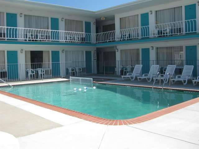 701 OCEAN AVENUE - UNIT 17 - FRIENDSHIP 7 CONDOMINIUM RENTALS IN NORTH WILDWOOD located BEACHBLOCK with a POOL - Come on down and enjoy your summer vacation in this tastefully decorated condominium. Unit 17 is conveniently located on the second floor with a great poolside view plus a large sundeck. The Friendship 7 condos are located beachblock and only a short stroll the the world-famous boardwalk. One bedroom, one bath this condo offers a kitchen with fridge, stovetop, microwave, coffeemaker. Amenities include wall a/c, pool, common area washer/dryer, one car off street parking. Sleeps 5, 1 double bed, 1 single, 1 double sleep sofa. Wildwood Rentals, North Wildwood Rentals, Wildwood Crest Rentals and Diamond Beach Rentals in all price ranges for weekly, monthly, seasonal and weekend vacation rentals plus Wildwood real estate sales of homes, condos, vacation and investment properties in and around Wildwood New Jersey. We offer over 400 properties plus exclusive vacation homes so you can book the shore rental of your choice online and guarantee your vacation at the Shore. Rent with confidence at Island Realty Group!
